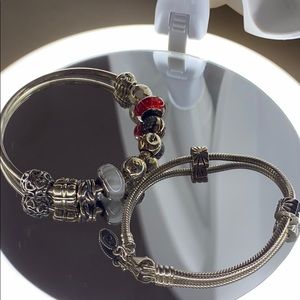 Two Pandora Bracelets With All Charms Included